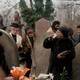Drinking and hanging out by the graveside of Uncle Son’s funeral as Baron Baker looks on
Charlie Phillips